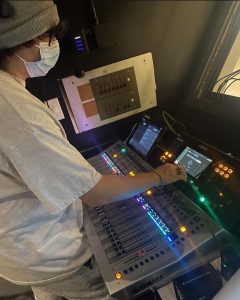 Student controlling sound board